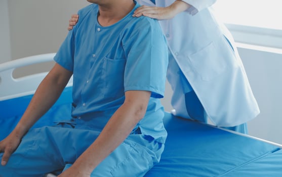 Patient doing some special exercises under supervision in a room photo