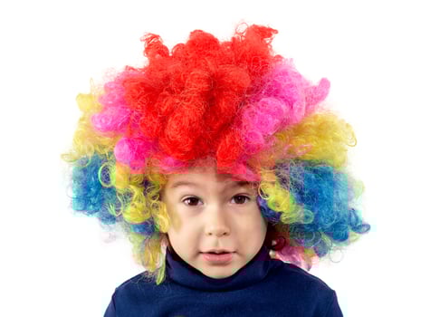 Child with clown wig photo
