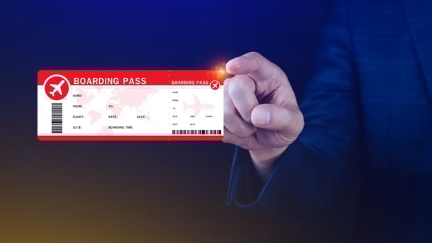Hand holding boarding pass tickets air travel concept, Choosing checking electronic flight ticket. photo