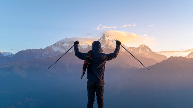A young traveller trekking in Poon Hill view point in Ghorepani, Nepal photo