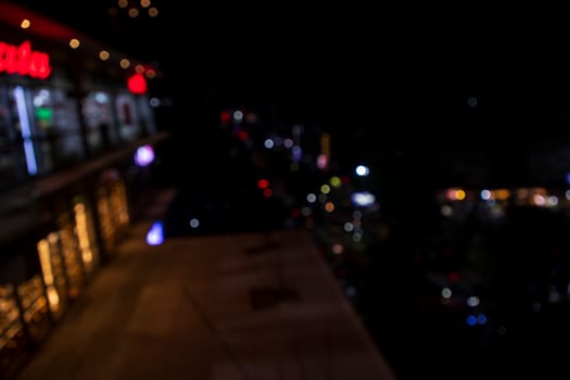 Colorful Defocus Abstract bokeh light effects on the street night black background texture wallpaper photo