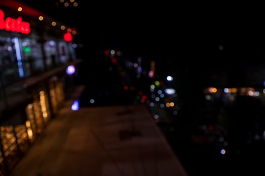 Colorful Defocus Abstract bokeh light effects on the street night black background texture wallpaper photo
