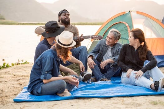group of young people having fun on the beach photo