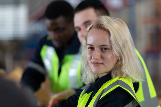 Portrait of worker in an auto parts warehouse, Relax after examine auto parts that are ready to be shipped to the automobile assembly factory. photo