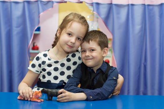 Portrait of a boy and a girl of preschool age. Little brother with sister. photo