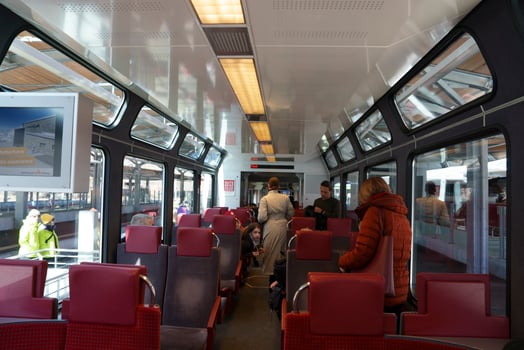 Passengers traveling in modern subway train photo