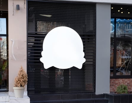 white round logo on building wall , exterior for mockup design photo
