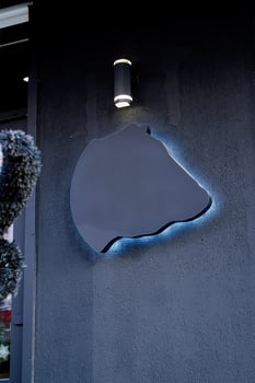 abstract style black logo on wall building exterior for mockup design photo