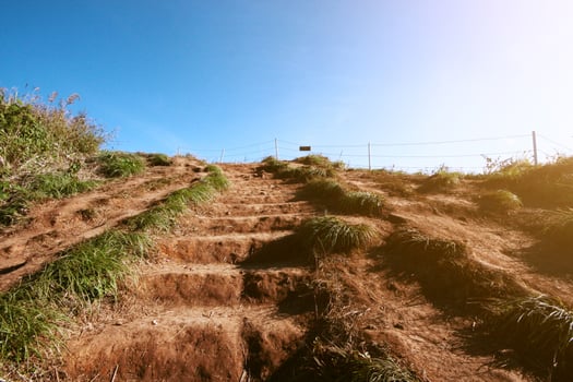 Natural Steps on the ground in forest leading up to the top of hill and on valley mountain in Thailand. Successful concept. photo