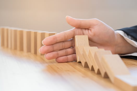 Protection finance, hand of businesswoman stopping falling, block effect collapse domino wooden, Recovery risk business, Management strategy and planning before destroy. Successful intervention. photo