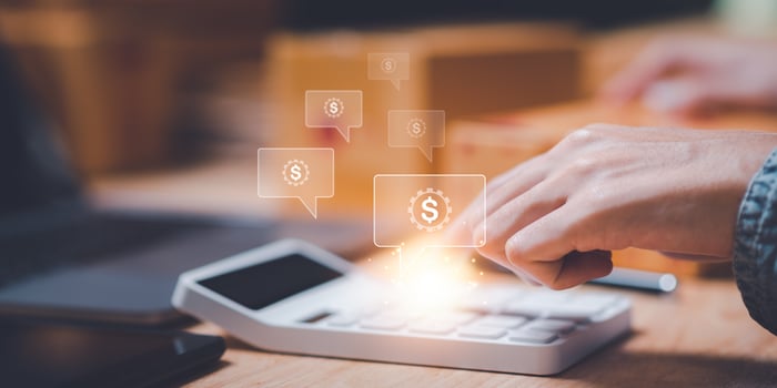entrepreneurs use calculator to calculate documents, profit and loss statement review concept of company performance, effective tax deduction planning for individuals and companies paying tax rates. photo
