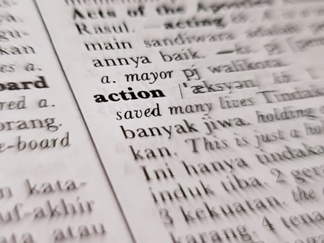 a close up of the word action in the English to Indonesian dictionary. For word background or wallpaper photo