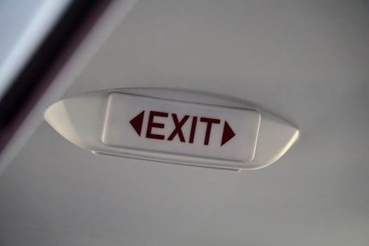 Emergency Exit Sign Inside an Airplane photo