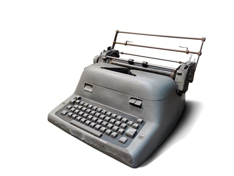 Old electric typewriter isolated on white background photo
