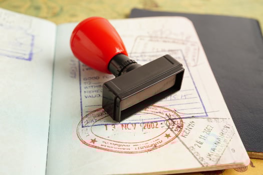 Visa and passport document to immigration at airport in country. photo