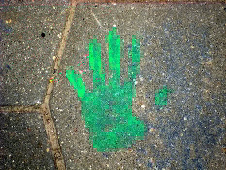 The imprint of his hands on the tile photo