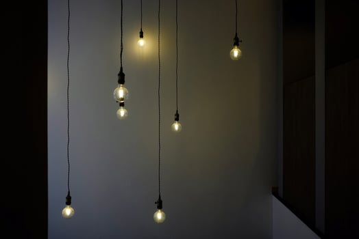 Light Bulbs Hanging from Ceiling. photo