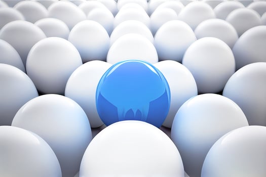 One Blue balloon and many white balls, the background. photo