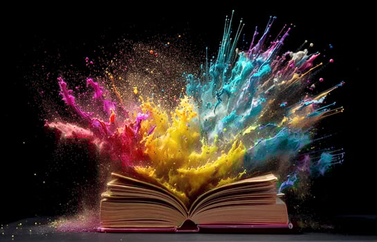An open book and an explosion of colorful colors. The Book of Knowledge. photo