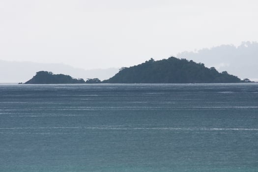Beautiful seascape of tropical island with blue sea and mountain beach at Koh Lipe in Satul Province, Thailand photo