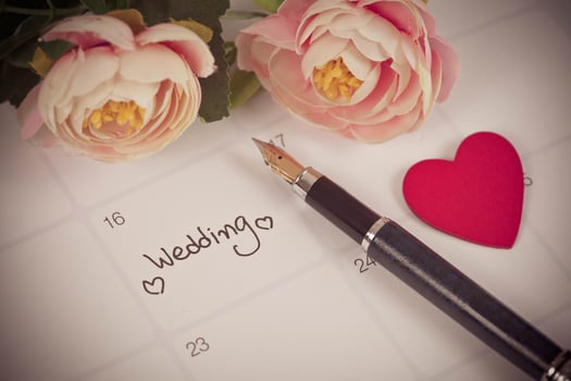 Reminder Wedding day in calendar planning and fountain pen with color tone. photo