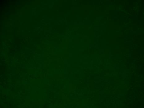 Dark green old velvet fabric texture used as background. Empty green fabric background of soft and smooth textile material. There is space for text.. photo