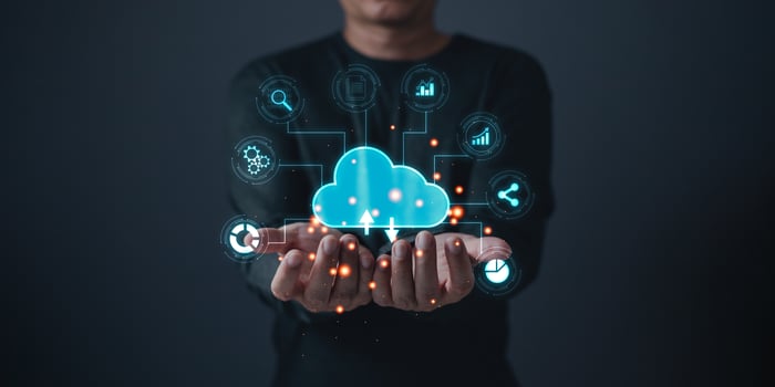 man hold cloud computing  system diagram show on hand.Data storage.Digital technology network service business in wireless storage concept. Implementing storage technology support in business. photo