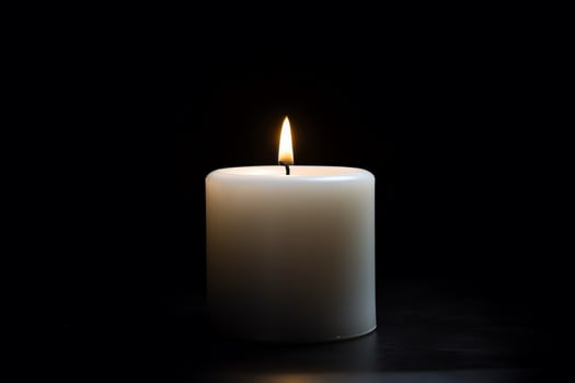 White Isolated Candle Aflame photo