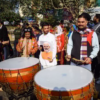 New Delhi, India - January 16 2023 - Thousands of people collected during Prime Minister Narendra Modi BJP road show, people during PM Modi big election rally in the capital photo
