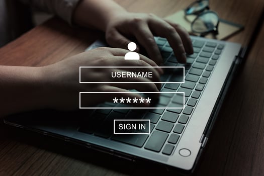 Woman using laptop with VR interface of secure access to user's personal information. Sign in or register with username and password. Cyber security and data protection. photo