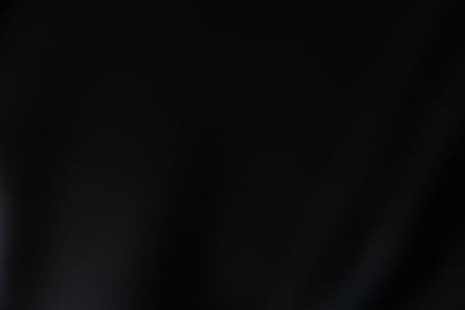 Black abstract background design. Black luxury fabric background with copy space photo