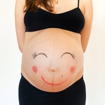 Belly with smiley face. photo