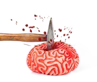 Human brain rubber with hammer blow and blood spill photo