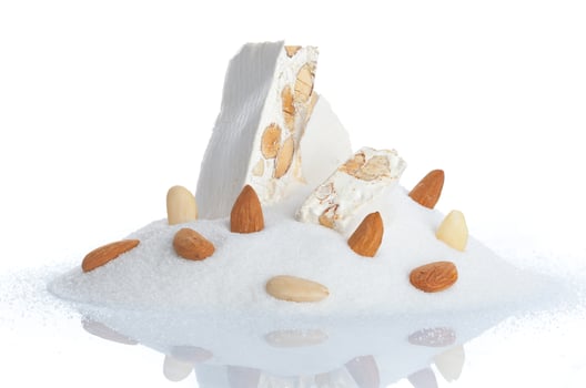 Sweet nougat with almonds photo