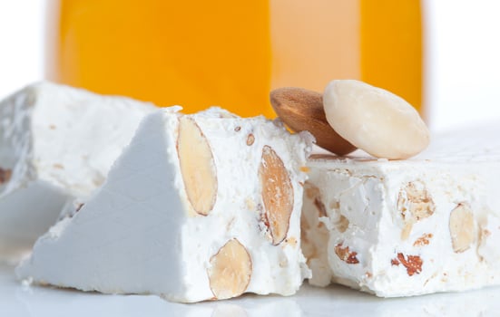 Sweet nougat with almonds photo