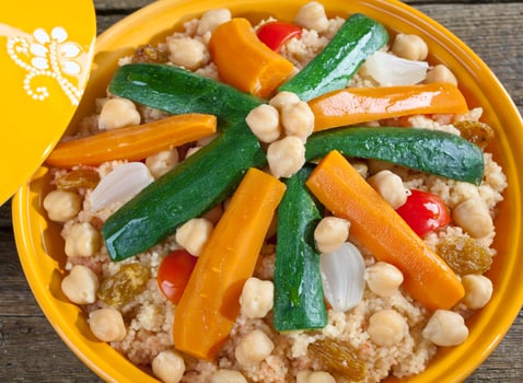 A plate of food with vegetables and rice photo