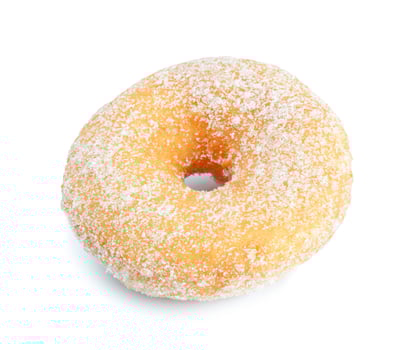 A sugar coated doughnut on a white background photo