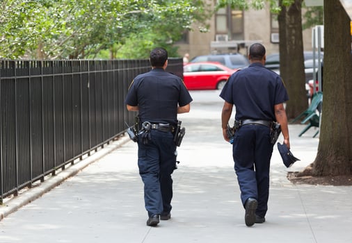 Two police officers from the back in the center of Manhattan. photo