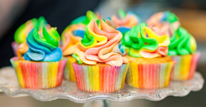 Colorful cupcakes with rainbow cream. photo