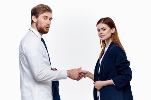 work colleagues shake hands communication contract light background photo