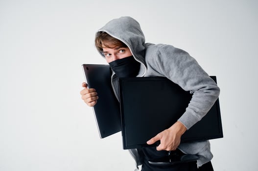 masked man hooded head hacking technology security light background photo