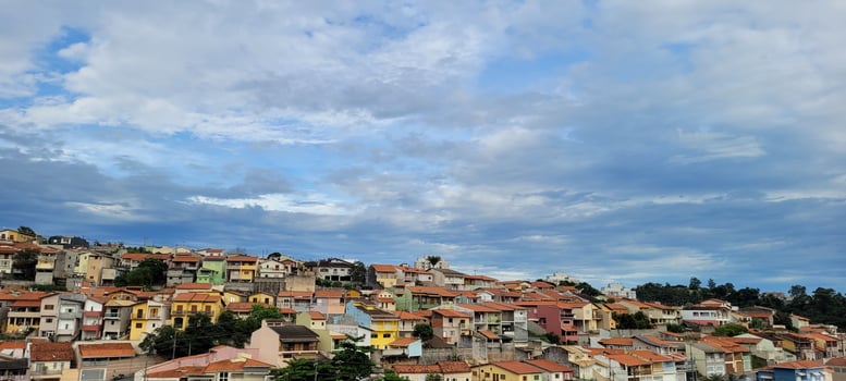 residential neighborhood on a day with cloudy sky photo