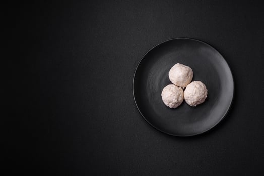 Delicious healthy steamed chicken cutlets or minced meatballs photo