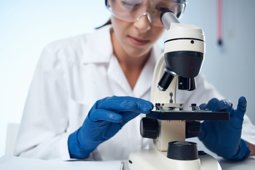 female doctor laboratory biotechnology and medicine analyzes photo