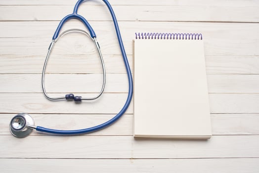stethoscope with notepad hospital health care photo