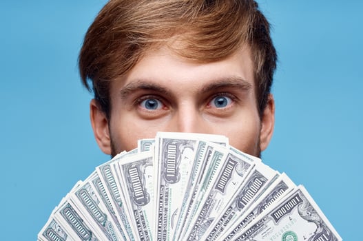 man holding money close-up office executive finance photo