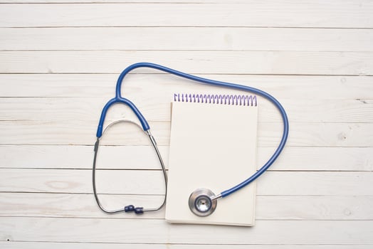 stethoscope with notepad hospital health care photo