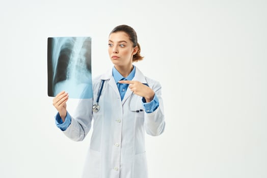 female doctor dressing gown x-ray emotion hospital photo