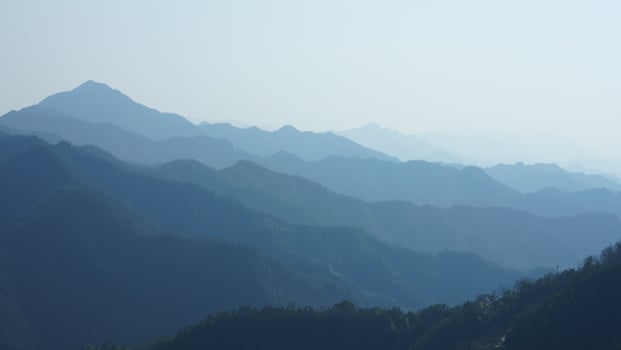 The beautiful mountains view from the top of the hill in spring photo
