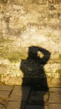 Self taking picture by the shadow and sunset sunlight photo